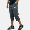 PANTACOURT PUMA ESS TAPE WOVEN ¾ PAN Hommes